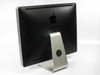 Apple iMac A1225 rear view showing black enclosure, aluminum stand, and built-in optical drive slot
