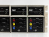 Det Tronics Rexnord Model 880 gas monitor modules – top row showing three units with %LFL display, channel number and manual select knobs; handwritten notation visible on rack frame