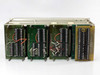 Det Tronics Model 880 mainframe – rear view of PCB monitor boards showing terminal block wiring rows and red jumper wires