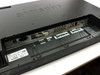 Samsung 400PXn rear angled view showing IEC AC inlet, VGA DB-9 ports, DVI port, BNC connectors, and rear port cluster