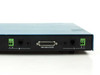 Spirent DLS 90 rear panel close-up showing Channel A and B terminal blocks, RJ ports, and central RS-232 DCE DB-25 connector