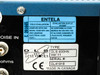 Spirent DLS 400HN Ver 11 rear panel label – ENTELA CSA field evaluation sticker and DLS TestWorks type/serial number label showing DL41918