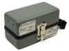Wilcom T319 and T355 units stacked showing both bottom labels with model numbers, serial numbers, and date codes
