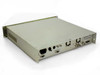 Newtec DVB-2063 NTC/2063/Lx satellite demodulator – rear panel 3/4 view showing IF BNC inputs, MON & CTRL port, ALARM connector, COAX outputs, and cooling fans