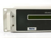 Newtec DVB-2063 front panel close-up showing rack ear, LCD display, and Newtec logo badge