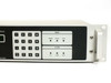 Newtec DVB-2063 front panel right-side close-up showing numeric keypad, MODE indicators (DEMOD, DECOD, DEFR), and ALARM indicators (ACT, MEM, TEST)