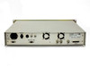 Newtec DVB-2063 rear panel straight-on view showing IEC power inlet, ALARM DB9, MON & CTRL DB9, IF BNC inputs A/B/C, cooling fans, COAX1/COAX2 BNC outputs, and SUB-D connector