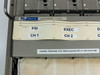 Graphtec WR3320 Linearcorder WR3310 nameplate close-up with caution label reading 'Channels 1,2,3, Heat is turned off, i.e. turn on to use'