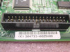 eMachines 304733 motherboard – close-up of 40-pin IDE connector and serial number label reading 304733-0025486