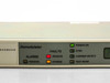 SDM-2020 front panel close-up showing Demodulator label, Alarms, Faults indicators including Receive and Stored LEDs, and status LEDs for Power On, Sync, Carrier Detect, and Test Mode