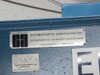 Thermotron SM-16-SL exterior panel showing Environment Associates Inc. reconditioner plate and Dewildt Environmental Inc. calibration sticker