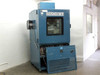 Thermotron SM-16-SL environmental test chamber front view with lower access panel open showing internal wiring and control components, unit labeled ENVCHM #4