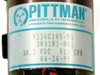 Close-up of Pittman motor label showing model 9236C185-R3, 303101-002, 30.3 VDC, 512 CPR, dated 04-26-95