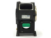 Hughes Leitz 102685 Prism Assembly – front face view showing green-filtered lower aperture and Hughes identification label