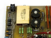 CPI Satcom Gen IV HV Module 01026320 – macro detail of Custom wound toroidal transformer area with green power resistors and electrolytic capacitors