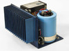 Standard Power SPS 120-15 linear power supply — side view showing large blue finned aluminum heatsink and Mallory electrolytic capacitor