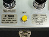 Alnor 7000U Dew Pointer front panel close-up showing Type No. 7000 label, 115V AC 50-60Hz, 6V battery specs, yellow inlet button, and Niles Illinois nameplate