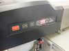 Synrad Fenix Flyer CO2 Laser Marker front panel showing EMERGENCY OFF, LASER ON/OFF, TEST MARK buttons, POWER % display reading 50, and READY/LASE status indicators