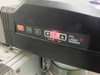 Synrad Fenix Flyer CO2 Laser Marker control panel close-up showing Power % display at 50, CO2 Laser Marker label, and READY and LASE indicator lights