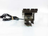 US Vibra 2028-A linear vibratory feeder – front end view showing drive motor housing, mounting feet, and power cord connection