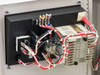 Interior close-up of AEC TDWF7M09S4 showing relay module assembly, control wiring, and DIN-rail mounted components on left cabinet panel