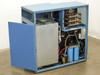 Hughes WD-8702-001 interior view – front door open showing card cage with multiple boards at top, large transformer, blue capacitors, and internal power supply module