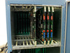 Hughes WD-8702-001 card cage – upper slot row with boards installed in slots labeled SYS CPU, MEM, IDX CPU, IEEE 488, SYS I/O, X-Axis, Y-Axis, Z-Axis, and Spare