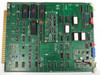 Hughes 2470-II Wire Bonder control card — green PCB with part number WD8607C3 visible, gold edge connector, populated with DIP ICs, discrete components, and blue capacitors
