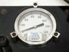 Close-up of right pressure gauge (0-150 PSIG) with TT Electronics calibration label dated 12-9-15, next due 12-11-17