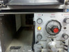 HP 1821A front panel powered on showing orange RESET indicator light glowing — only indicator illuminated during power-on