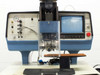 Hughes 2500 Die Bonder front panel view showing bonding head assembly, vacuum chuck work stage, Panasonic CRT monitor, and emergency stop button