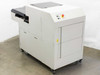 Philips Assembleon PA269921 M20010 Large Component Sequencer – left rear three-quarter view showing leveling feet, control panel with E-Stop and yellow warning label