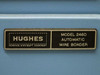 Hughes Aircraft Company Model 2460 Automatic Wire Bonder nameplate on blue cabinet front panel