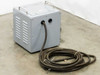 Ikegami Tsushinki 5306220 3.3kVA power transformer – rear/side view showing vented enclosure with heavy-duty output cable looped on floor