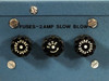 Syn-Optics AFS3000D – fuse panel detail showing three 2 Amp Slow Blow fuse holders labeled 'FUSES-2AMP SLOW BLOW'