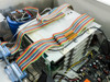 Syn-Optics AFS3000D – interior close-up of ribbon cables routed over internal card stack assembly