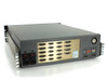Xicom XTC-140D rear panel showing dual IEC power inlets labeled 100-260 VAC and DB15 AUX and RS-232 connector bank