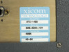 Xicom Technology label on XTC-140D showing Model No. XTC-140D, Part No. 305-0244-101, Serial No. 4884, Manufactured 45-00