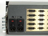 XTC-140D rear panel left section showing dual IEC AC power inlets at 100-260 VAC with rocker switches and AUX A through E DB15 connectors