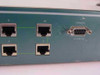Network Peripherals NP-SET-210 — front panel close-up showing RJ-45 ports 4, 5, 9, 10 and DB-9 console port labeled DCE 9600