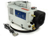 Leybold SOGEVAC SV65 BI FC vacuum pump front-left view showing blue rating label, exhaust port, power cable, and DB9 connector
