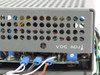 Lambda LND-Y-152 power supply – bottom view showing VDC ADJ trimmer, ventilation perforations, and internal PCB components