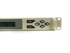 Adaptive Broadband SDM-2020 satellite modulator – front panel right-side close-up showing LCD display, ENTER and CLEAR buttons, and diamond navigation keypad