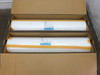 Two DNP Z777 TPO solar encapsulant rolls side by side inside open cardboard box on pallet