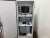 SCE Custom Hi-Pot Control Cabinet interior — upper shelf detail showing touchscreen monitor mounted to upper door, keyboard and mouse on interior shelf, and cable routing