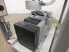 Balzers Pfeiffer DUO 016B rotary vane vacuum pump mounted in metal frame, three-quarter front-left view showing motor housing and cooling fins