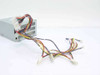 HP 0950-2700 Astec SA147-3505 145W ATX power supply — side view showing full cable harness with multiple Molex 4-pin peripheral and Berg floppy connectors