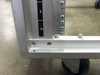 Lower corner of CPI Megaframe rack showing rack unit numbering (44–45) and heavy-duty caster wheel