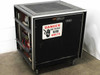 Airco Temescal CV-8 CV8-2587 high voltage power supply station front view with Danger High Voltage 10,000 Volts warning label and cabinet door