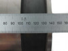 Close-up side view of slitting groove channel with metric ruler showing groove width of approximately 30mm